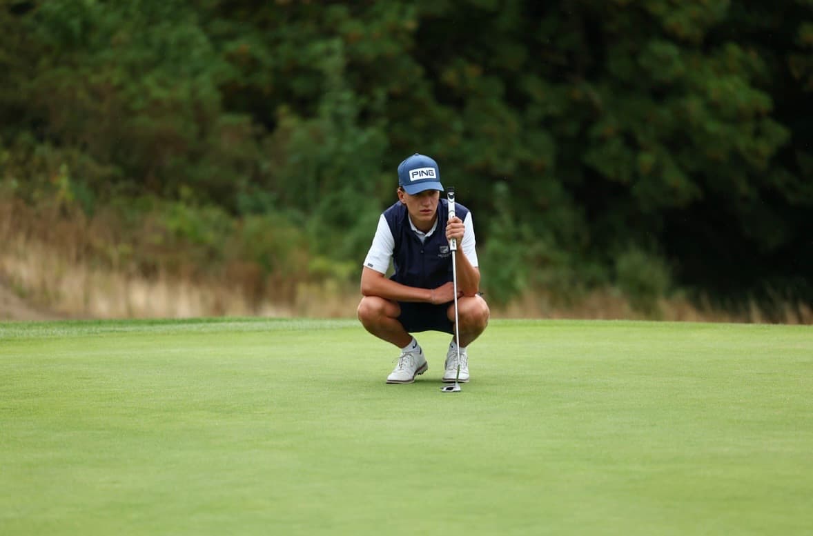 Seb Creaser reading a putt